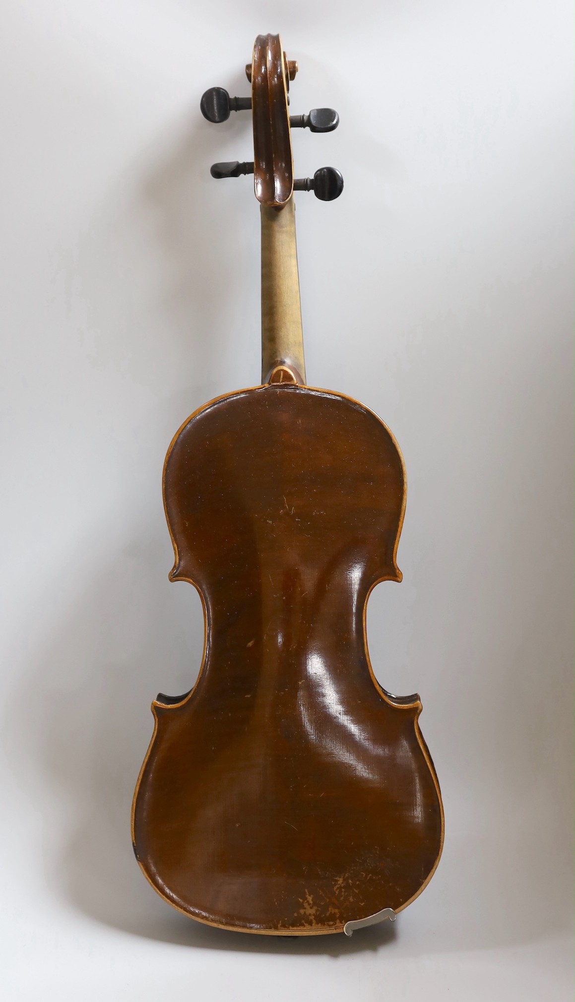 A Maidstone violin, with bow, cased. violin 59 cms high.